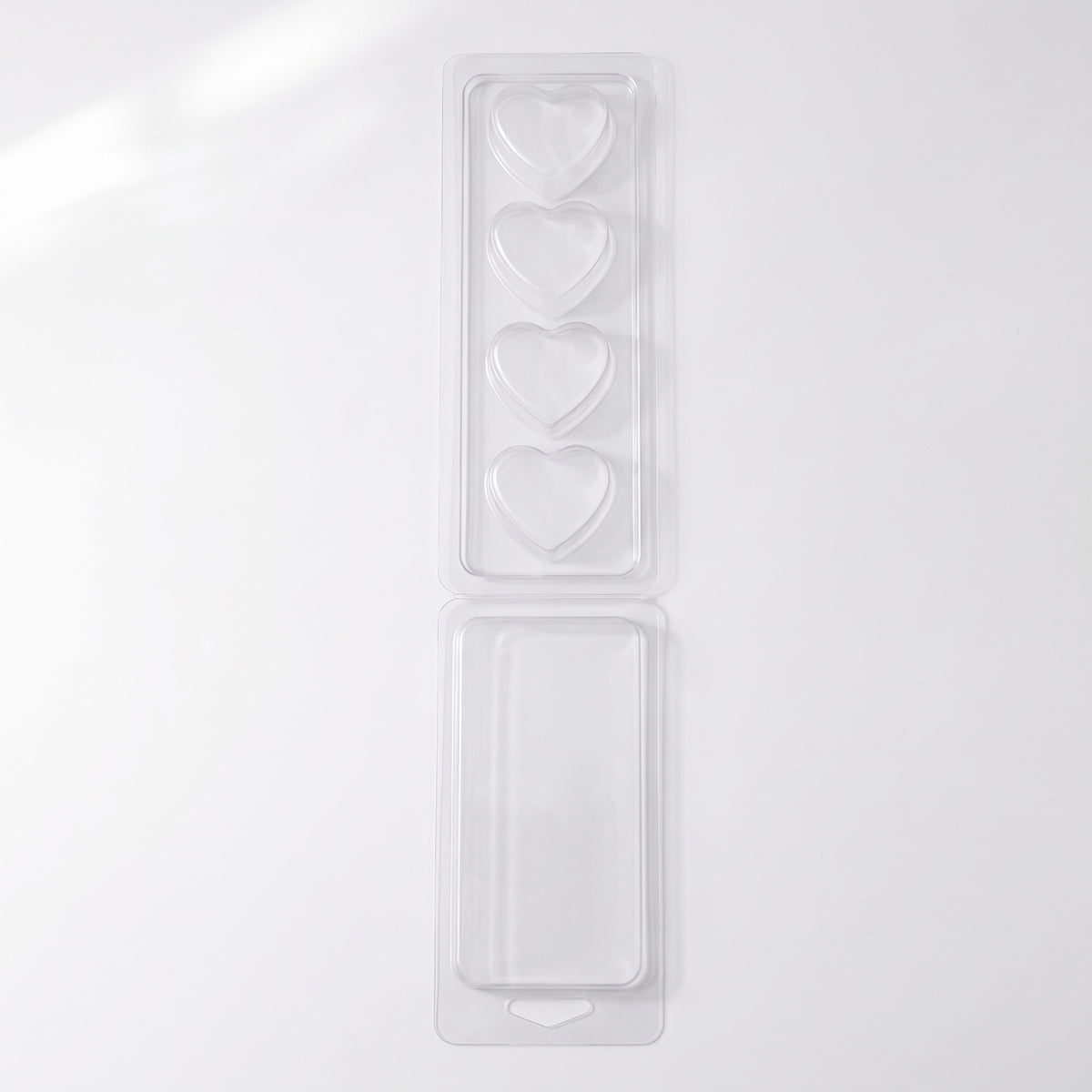Detaliu matriță clam shell 4 inimi, wax melts în ambalaj PET